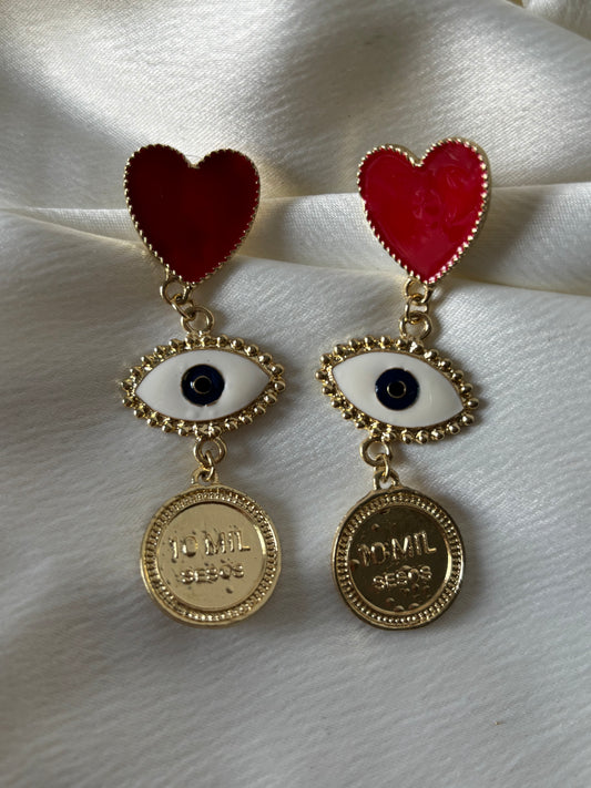 Aretes Corazon Ojo Moneda